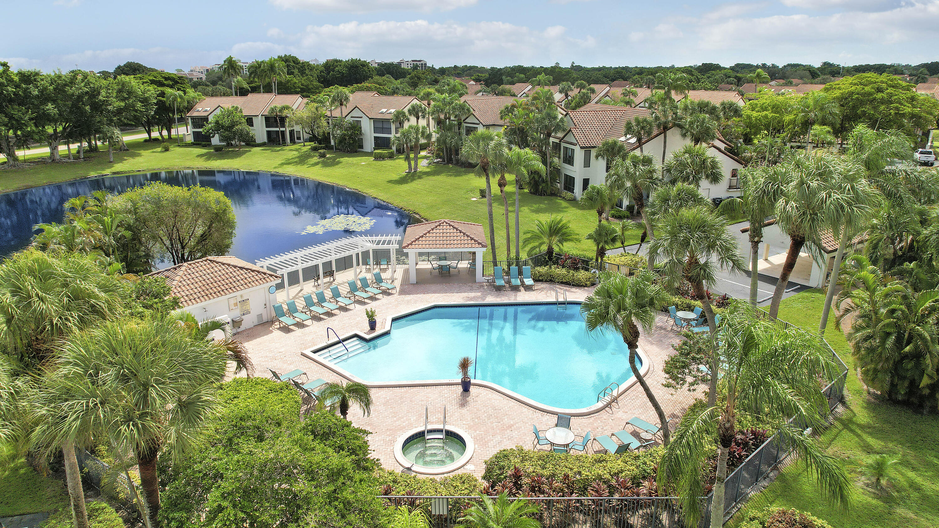 7860 Seville Place, Unit 2203 Boca Raton, FL 33433 - Photo 34 of 43 an aerial view of a house with outdoor space swimming pool and tennis court