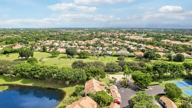 an aerial view of a house with a garden