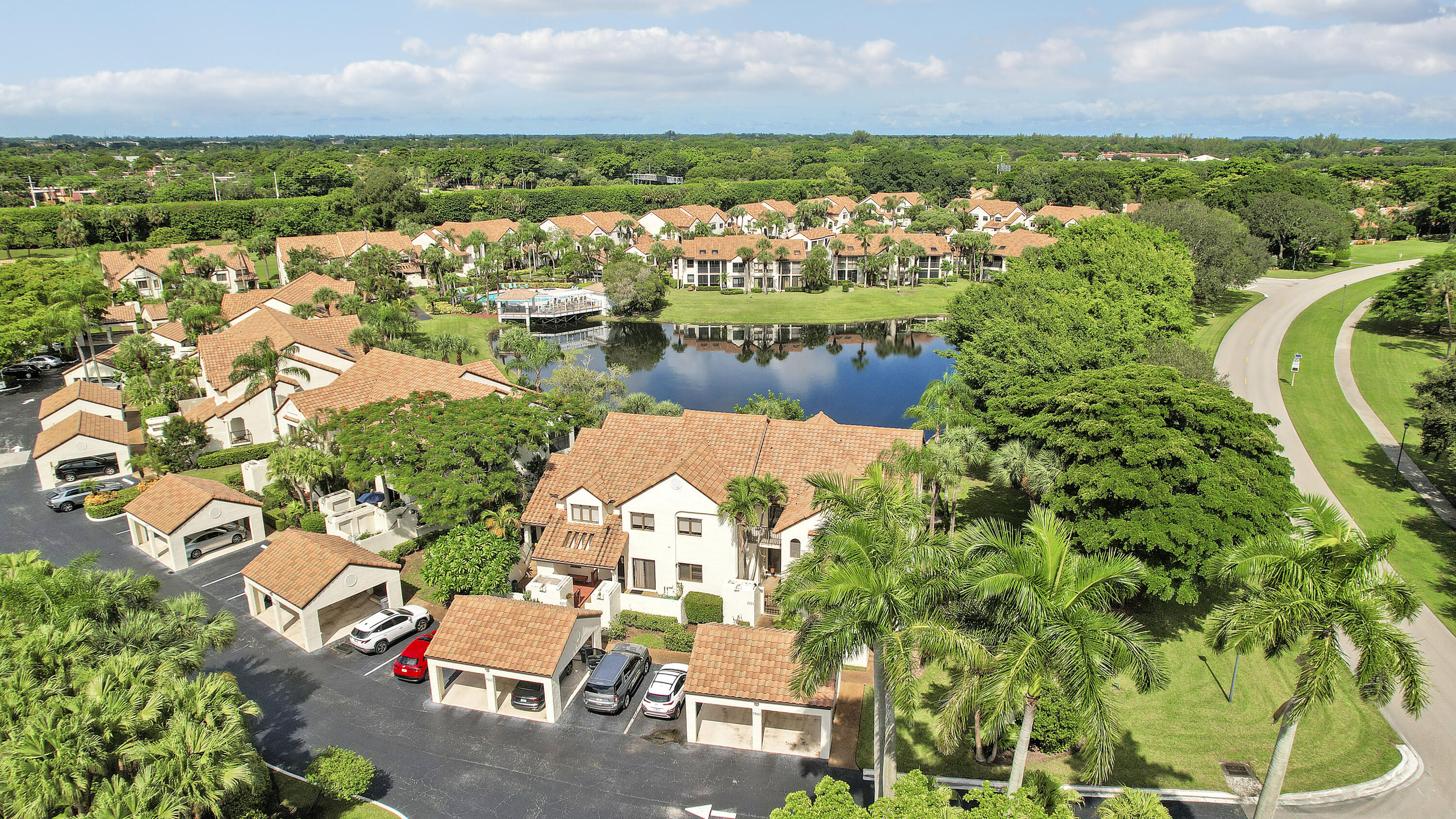 7860 Seville Place, Unit 2203 Boca Raton, FL 33433 - Photo 36 of 43 an aerial view of residential houses with outdoor space and river