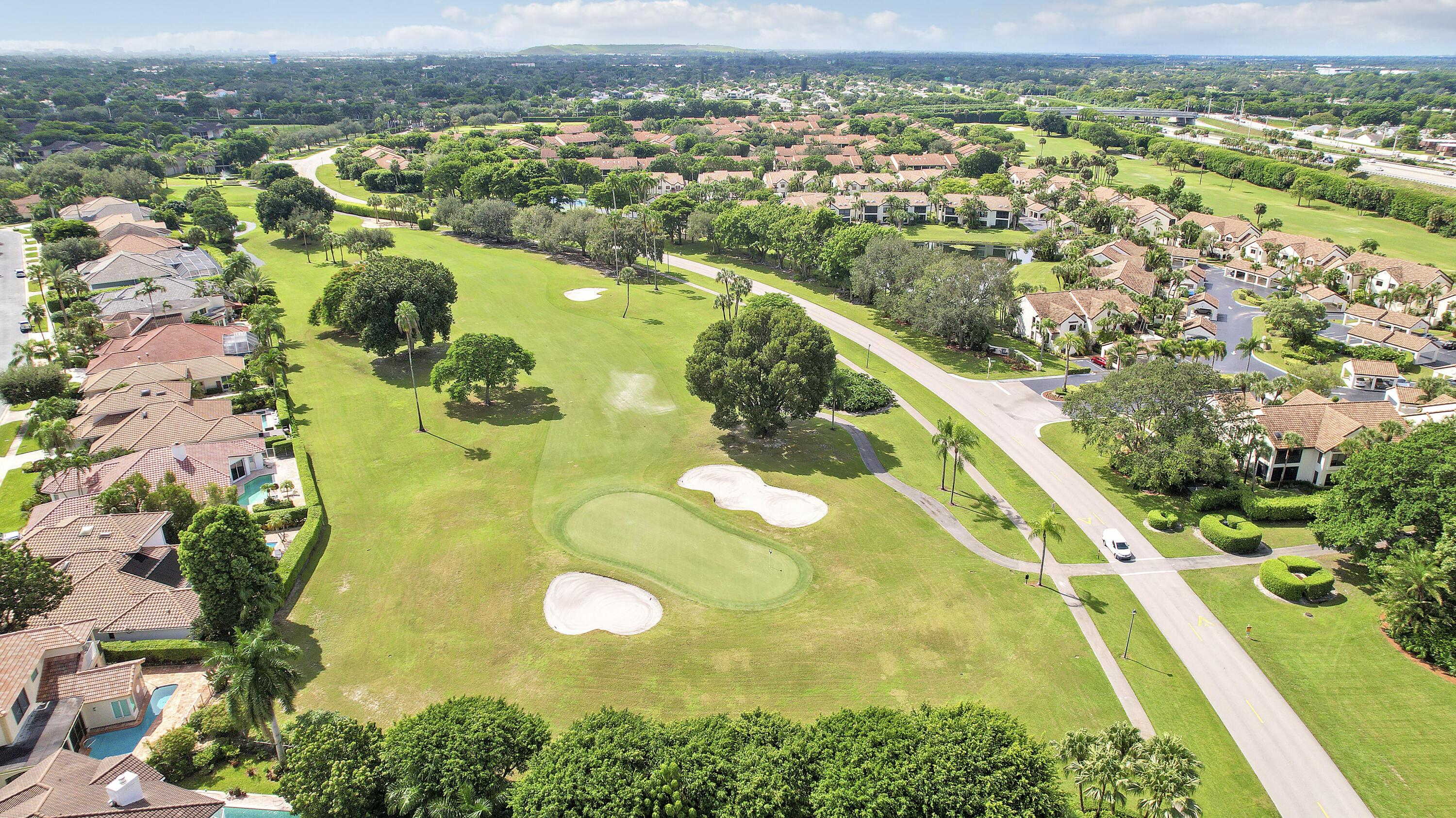 7860 Seville Place, Unit 2203 Boca Raton, FL 33433 - Photo 41 of 43 an aerial view of residential houses with outdoor space
