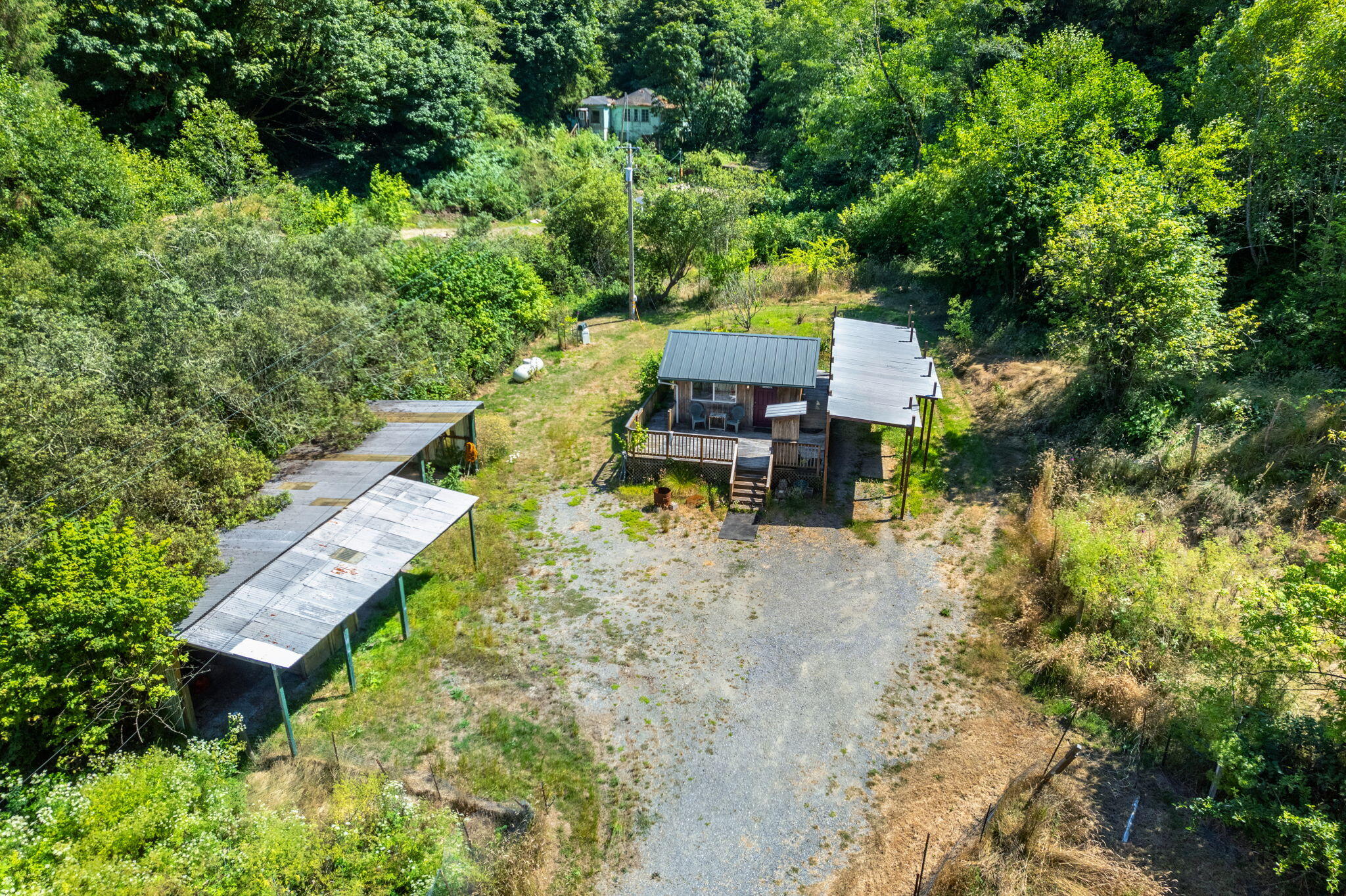 755-763 Oeschger Road Ferndale, CA 95536 - Photo 8 of 36 an aerial view of a house with swimming pool and garden