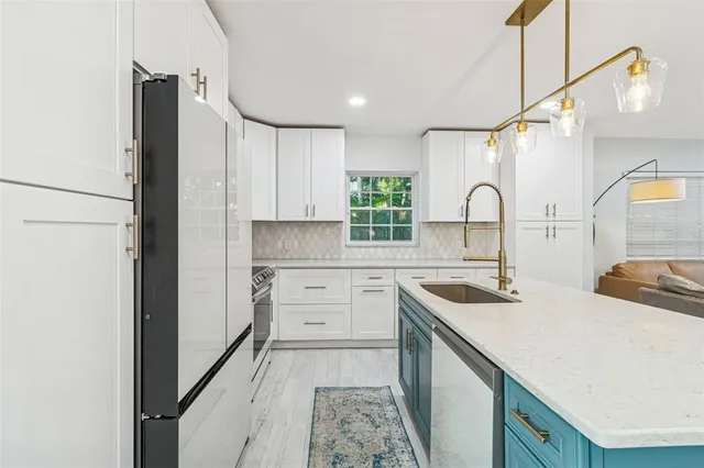 a view of a room with wooden floor and window