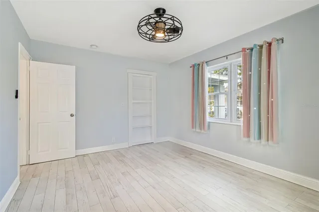 a kitchen with stainless steel appliances a stove a refrigerator and cabinets