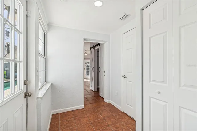 an aerial view of a house with outdoor space