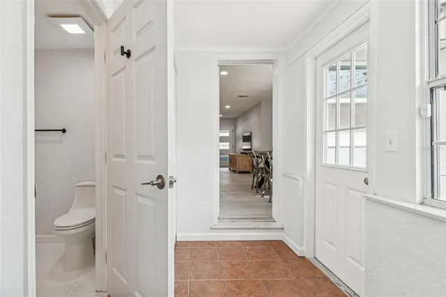 an aerial view of a house with outdoor space and street view