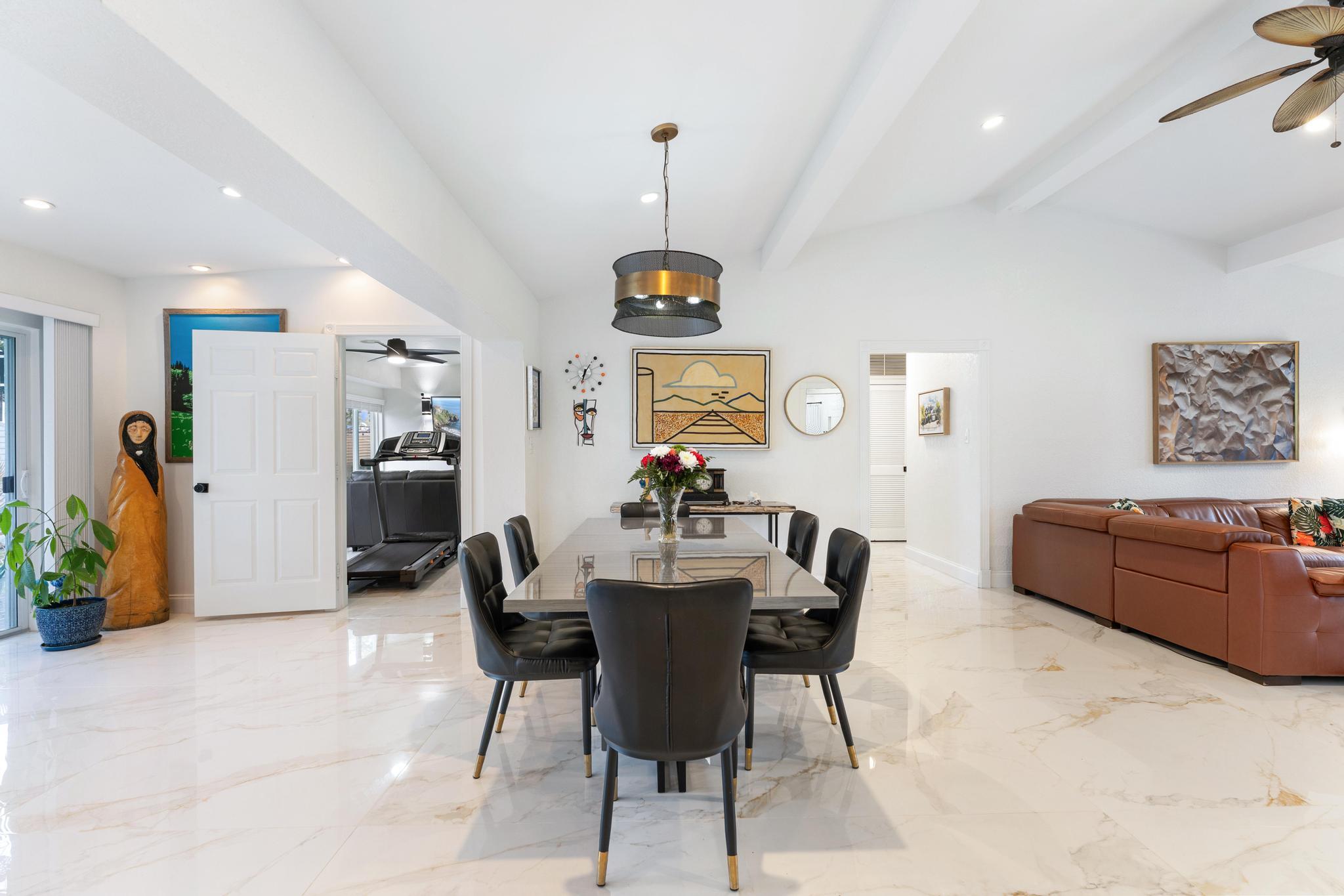 3179 Melaleuca Road West Palm Beach, FL 33406 - Photo 22 of 49 a dining room with furniture and window