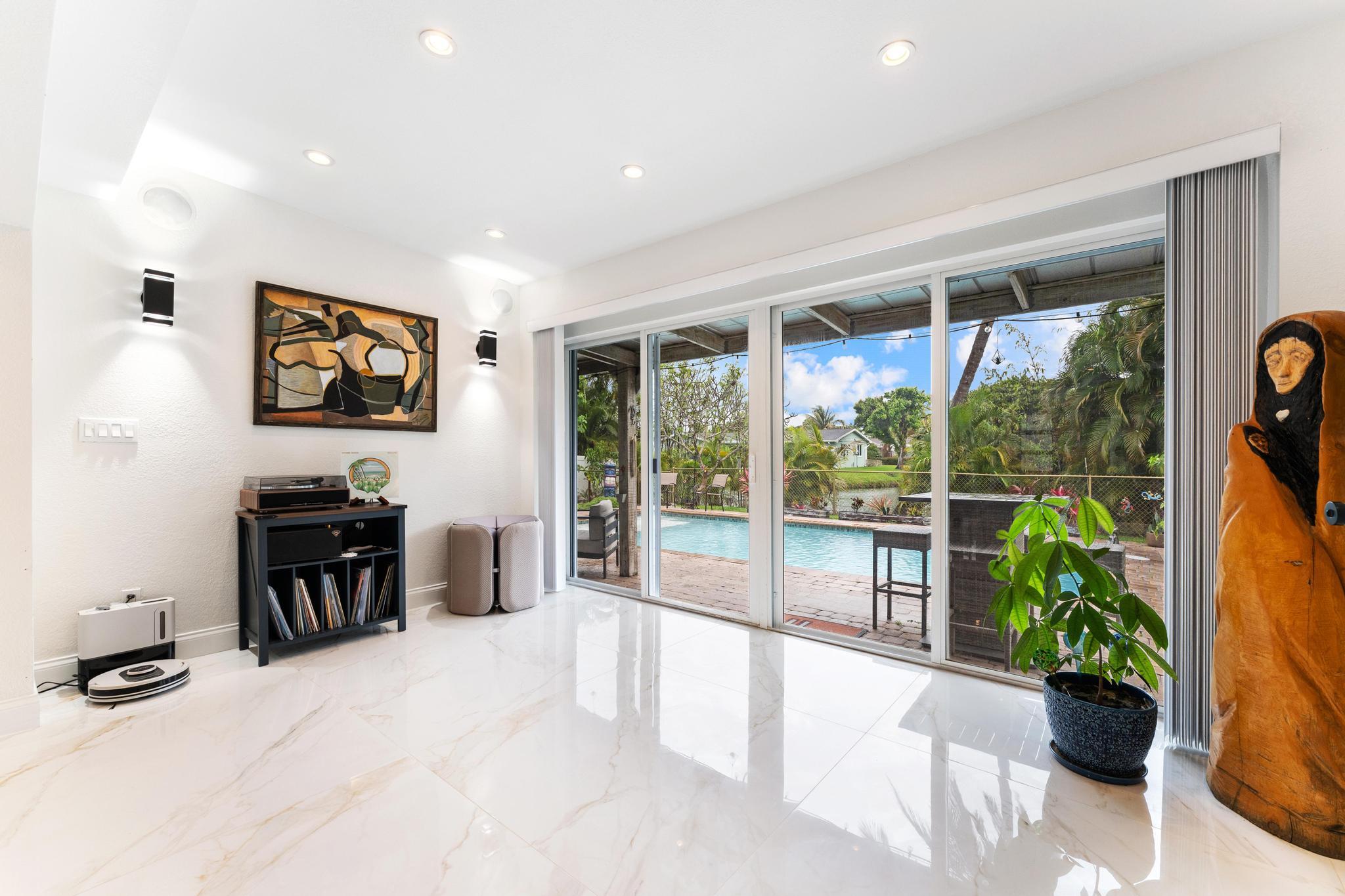 3179 Melaleuca Road West Palm Beach, FL 33406 - Photo 25 of 49 a view of a livingroom with furniture window and garden view