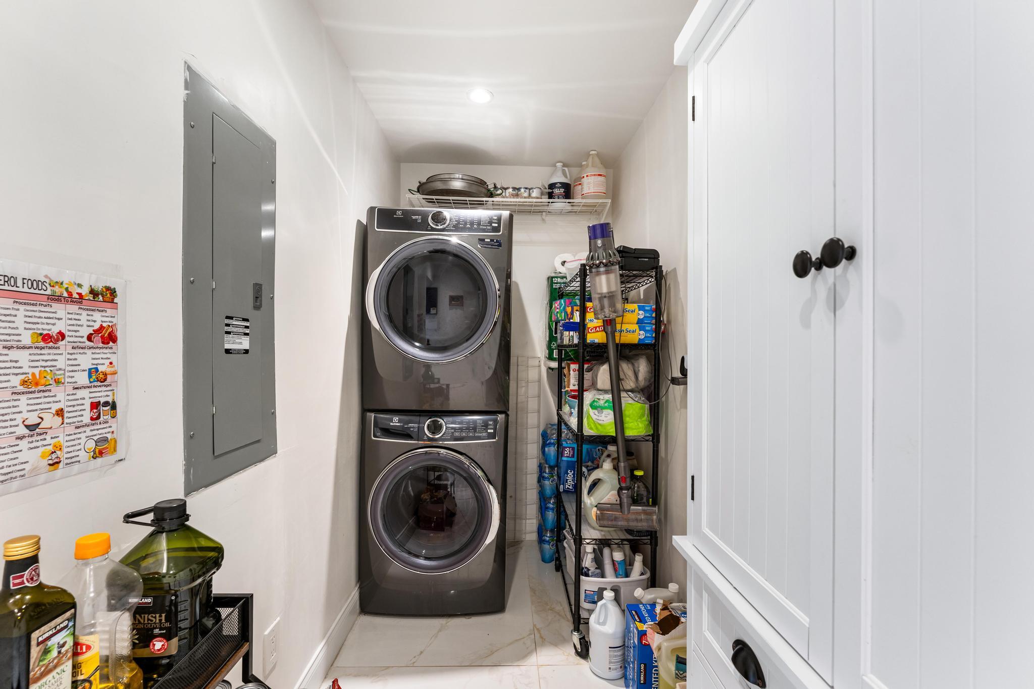 3179 Melaleuca Road West Palm Beach, FL 33406 - Photo 30 of 49 a utility room with dryer and washer