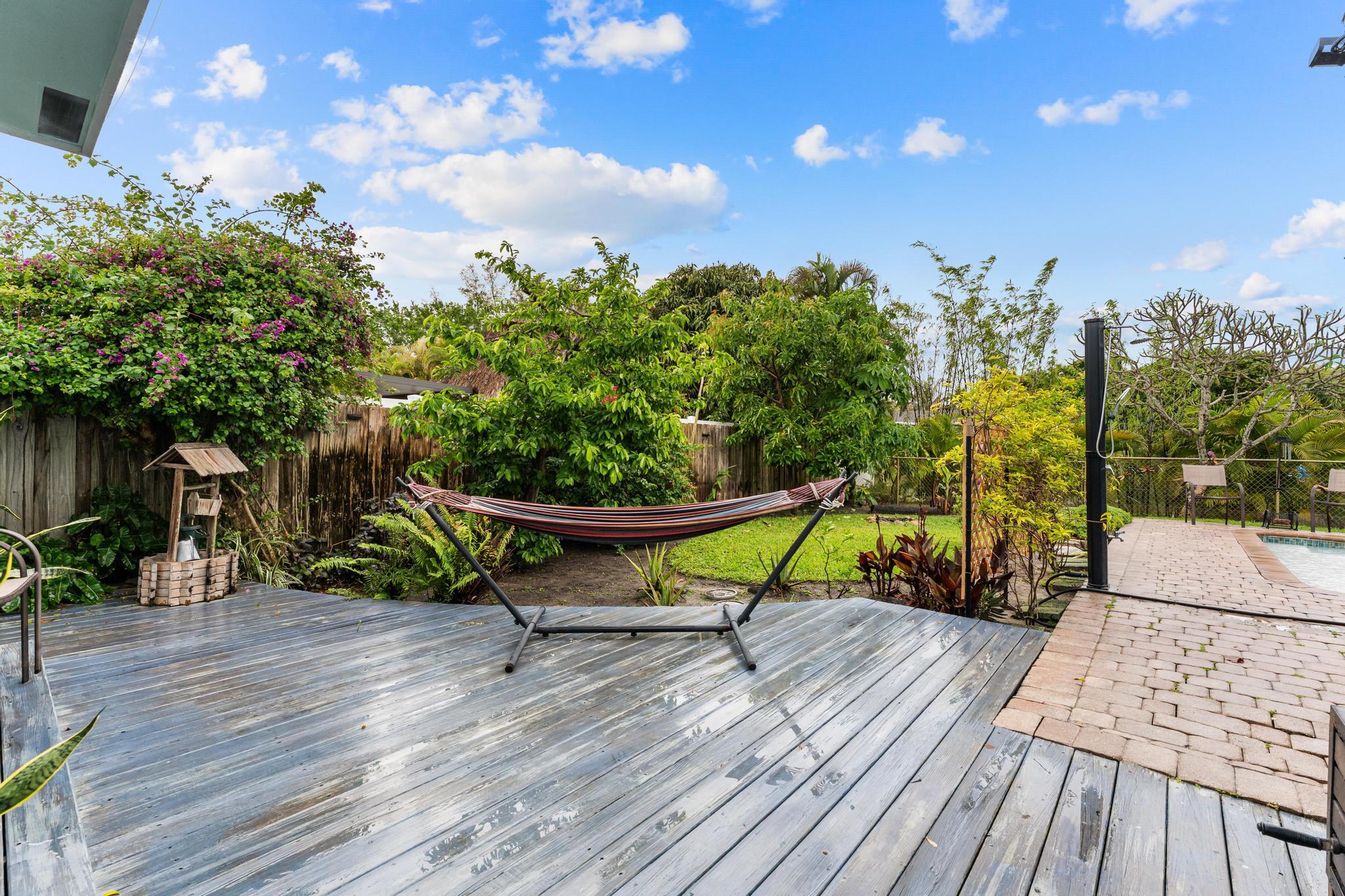 3179 Melaleuca Road West Palm Beach, FL 33406 - Photo 39 of 49 a view of a terrace with sitting area