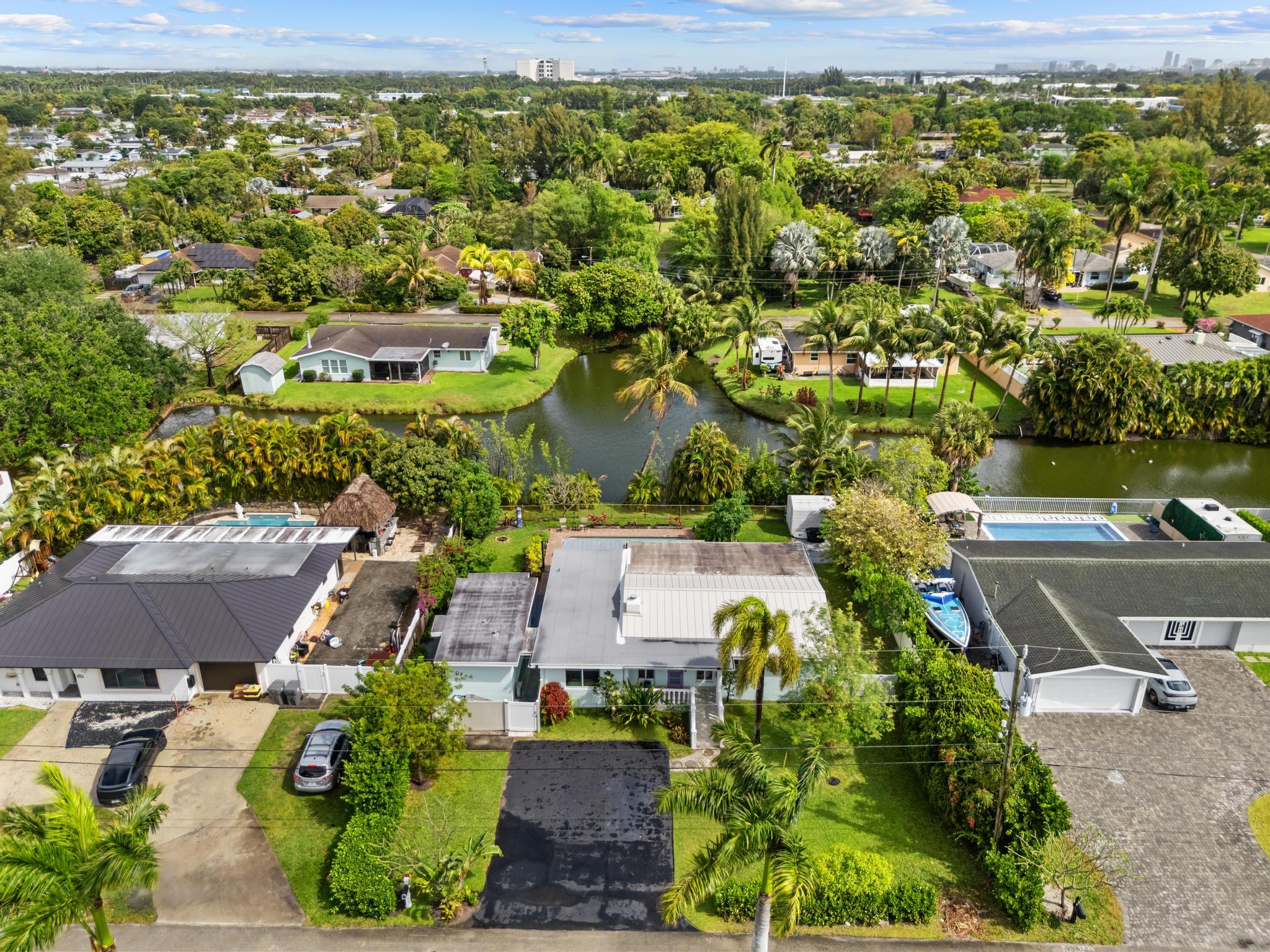 3179 Melaleuca Road West Palm Beach, FL 33406 - Photo 46 of 49 an aerial view of residential houses with outdoor space