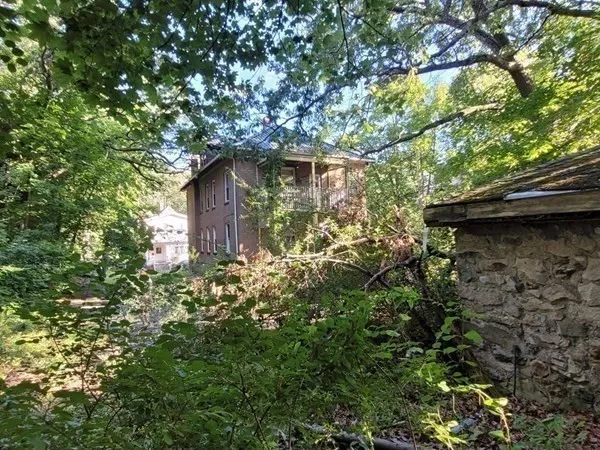 a view of a street with cars