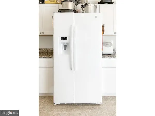 a close up of a utility room with a sink