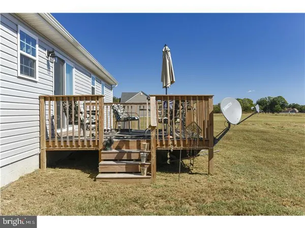 a view of a balcony with chairs