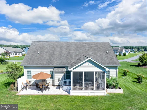 a aerial view of a house with garden