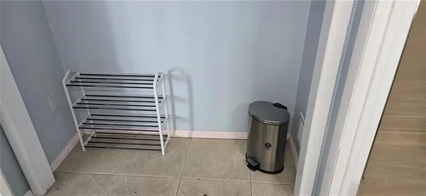 a view of a living room and kitchen