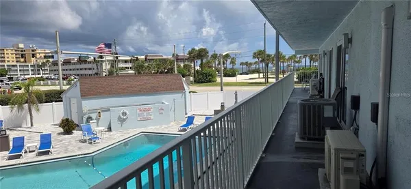 a view of a balcony with city view