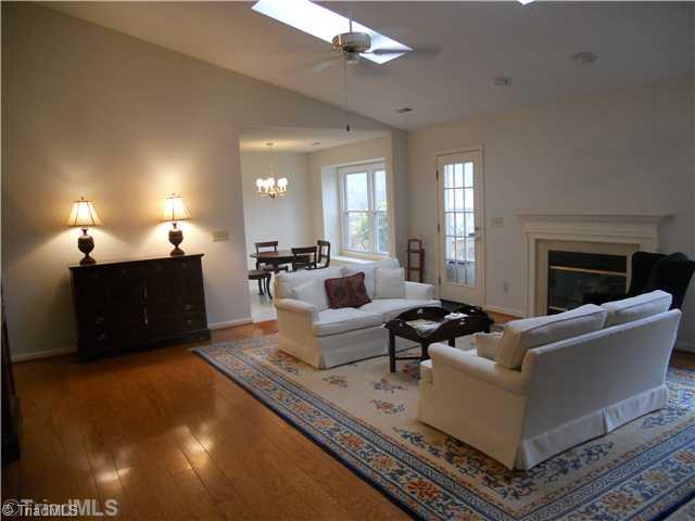 2602 Castle Croft Road Greensboro, NC 27407 - Photo 3 of 16 Living Room. Another view of the living room...cathedral ceiling, sky lights.