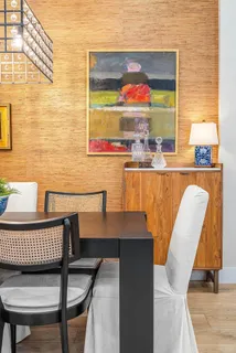 a kitchen with granite countertop stainless steel appliances a sink cabinets and refrigerator