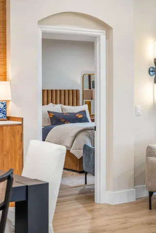 a bathroom with a double vanity sink mirror and shower