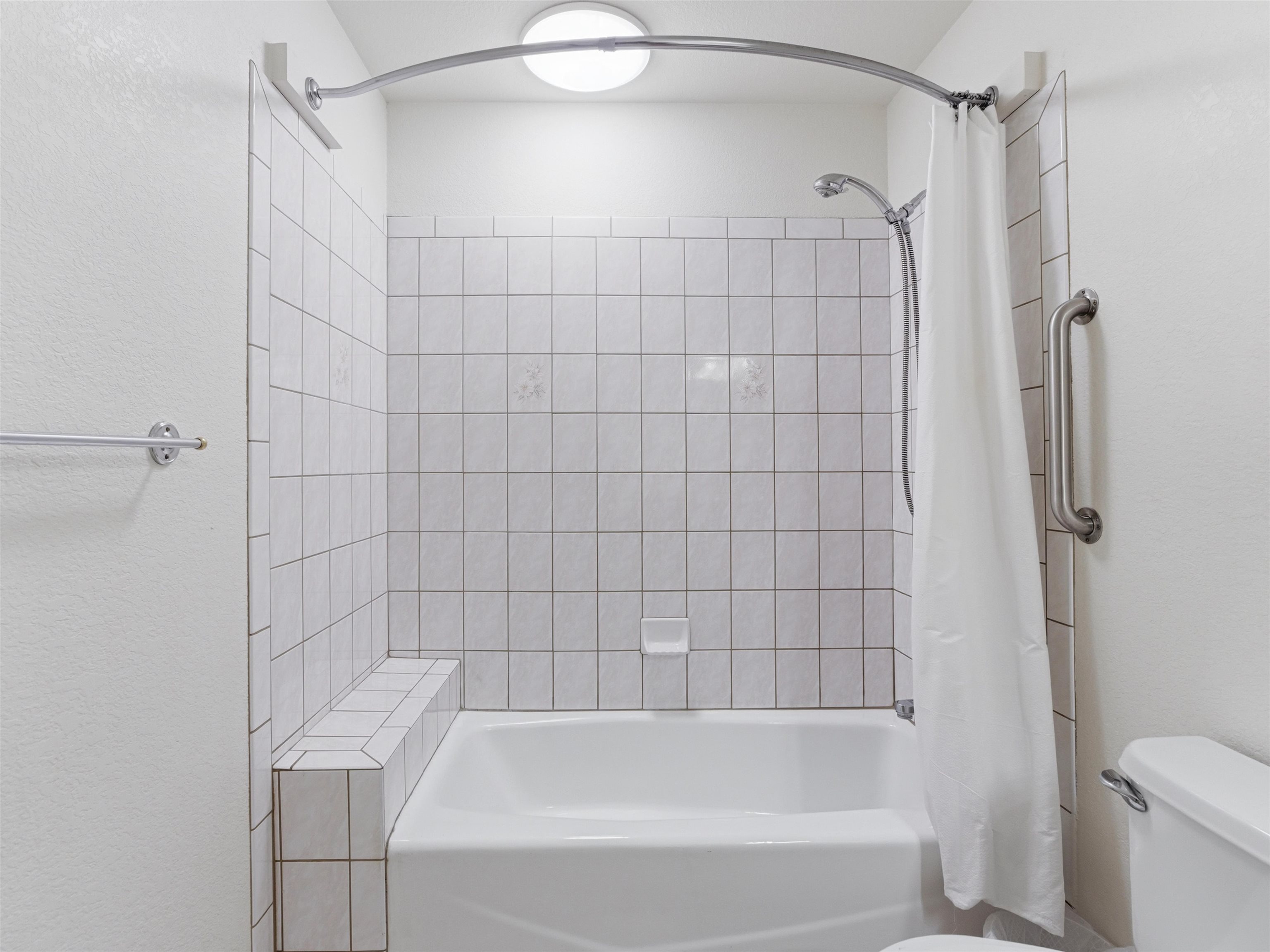 3082 Shadowbrook Court Grand Junction, CO 81504 - Photo 20 of 28 a bathroom with a bathtub and a shower