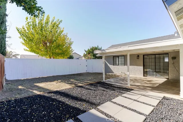 a view of a house with a garden