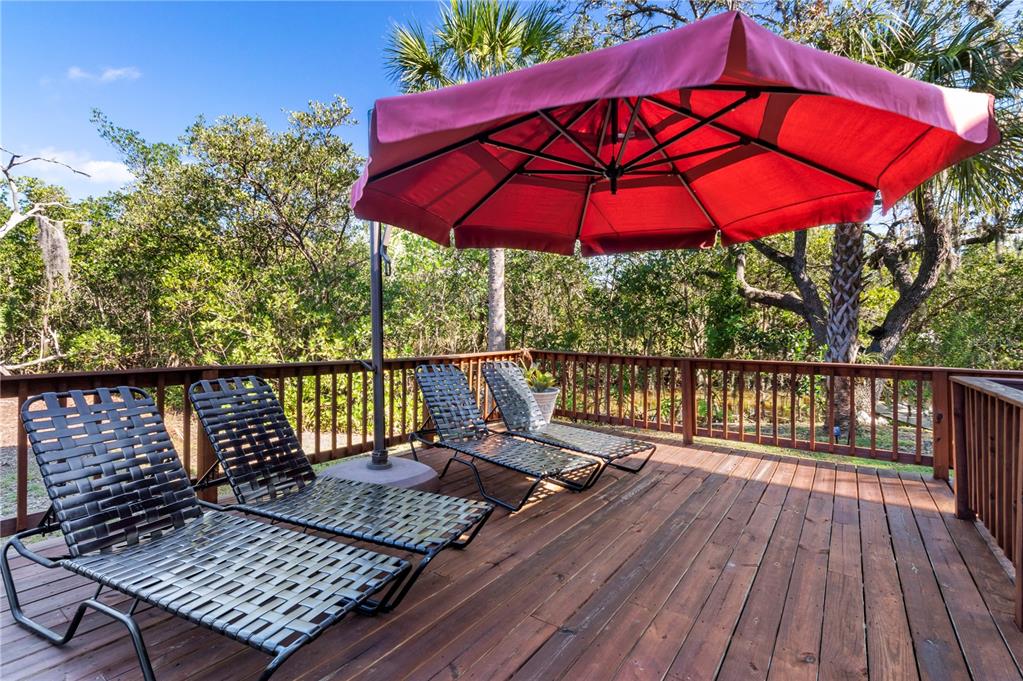 7325 Holly Road Terra Ceia, FL 34250 - Photo 51 of 87 a view of balcony with wooden floor and outdoor space