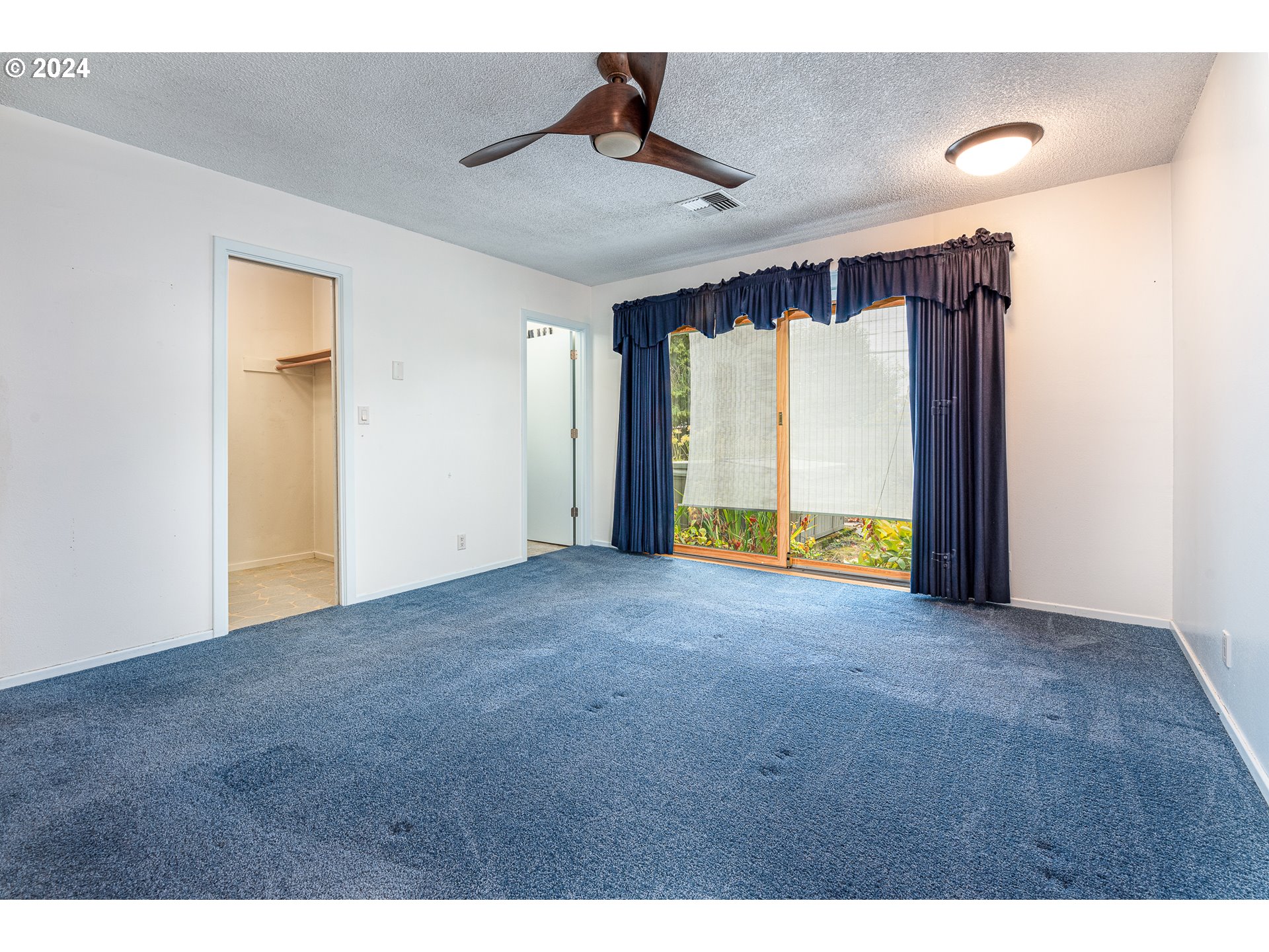 1039 Nancy Avenue Springfield, OR 97477 - Photo 17 of 40 a view of an empty room with a window