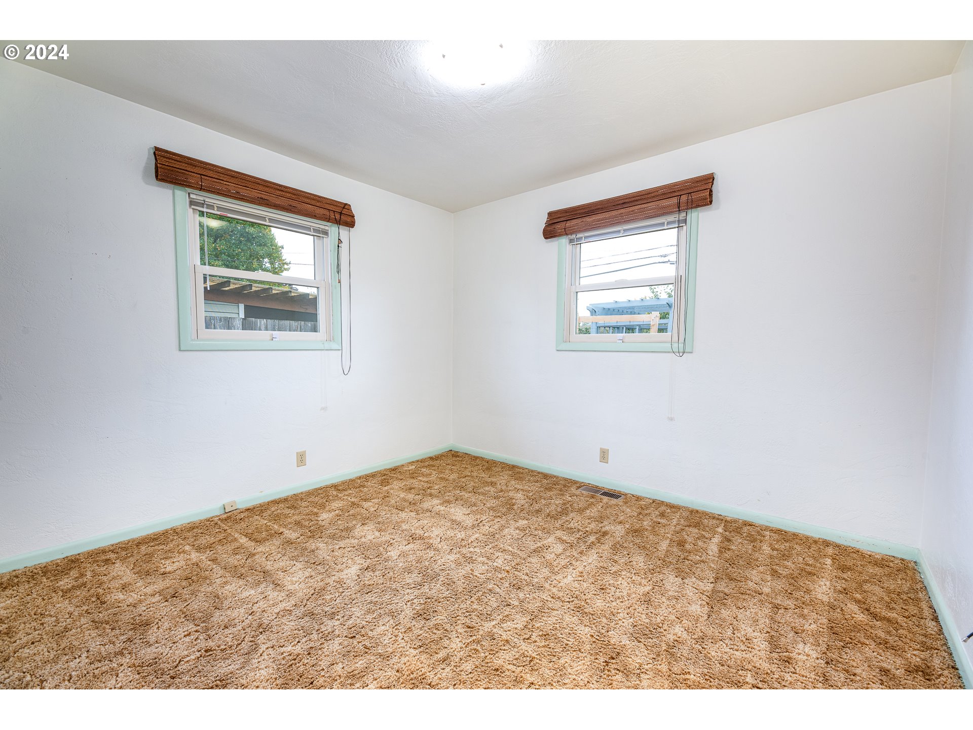 1039 Nancy Avenue Springfield, OR 97477 - Photo 19 of 40 a view of an empty room with a window