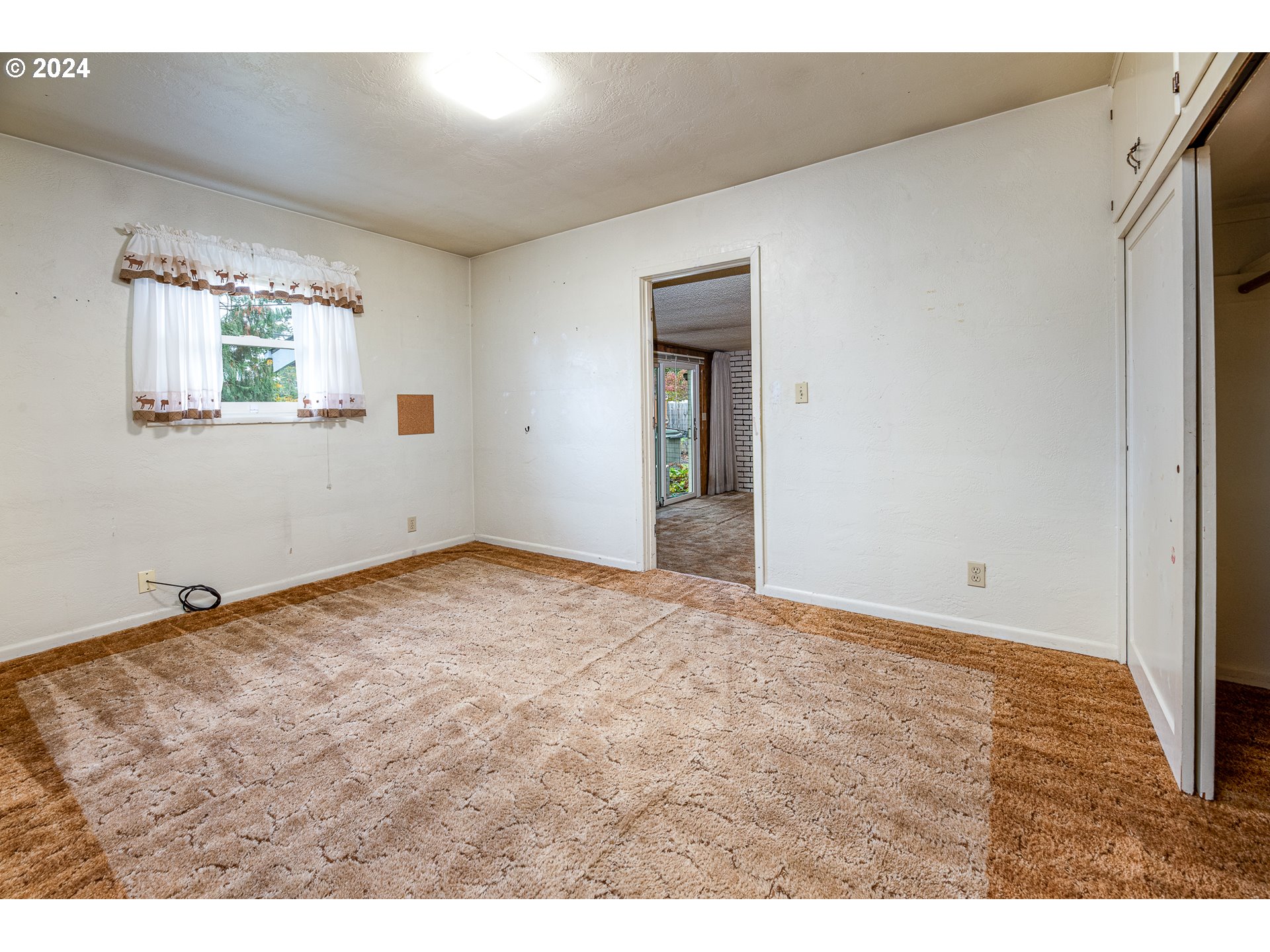 1039 Nancy Avenue Springfield, OR 97477 - Photo 24 of 40 a view of an empty room with a window