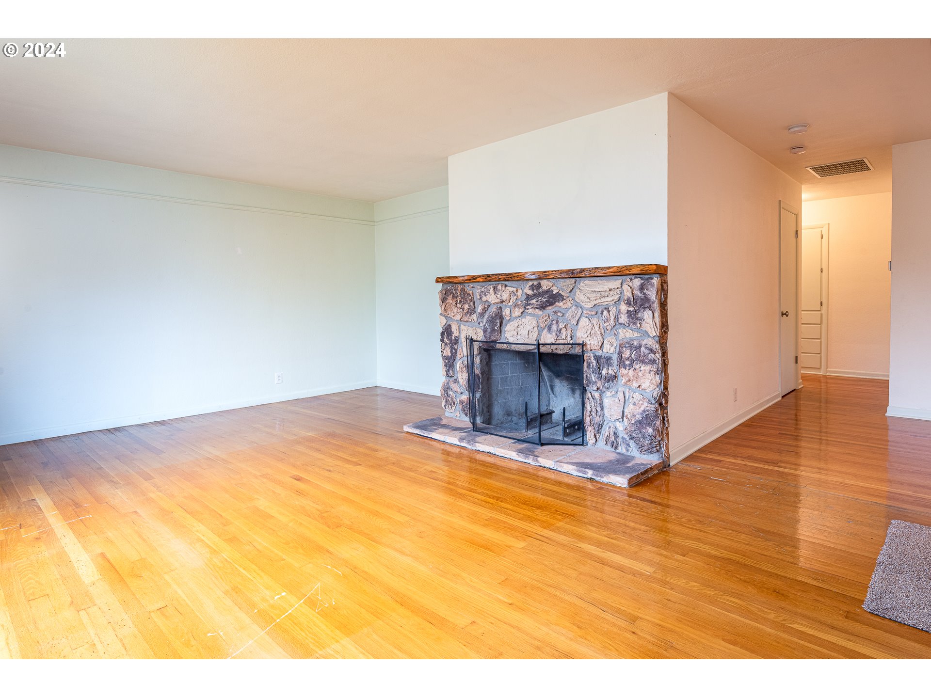 1039 Nancy Avenue Springfield, OR 97477 - Photo 6 of 40 a view of empty room with wooden floor