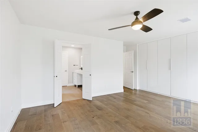 a bathroom with a double vanity sink mirror and