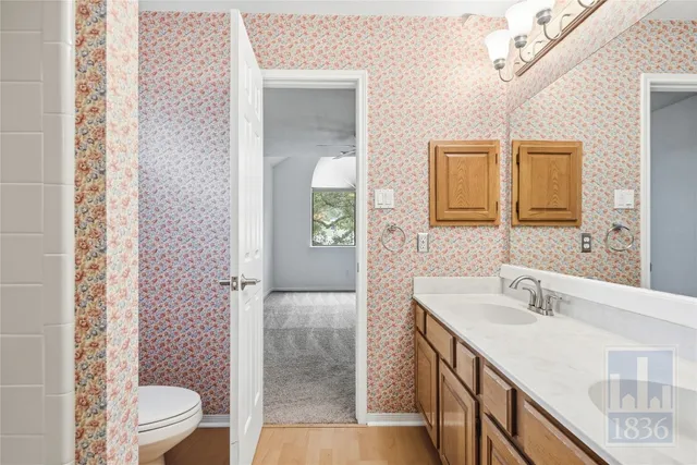 a bathroom with a sink a mirror and a bathtub