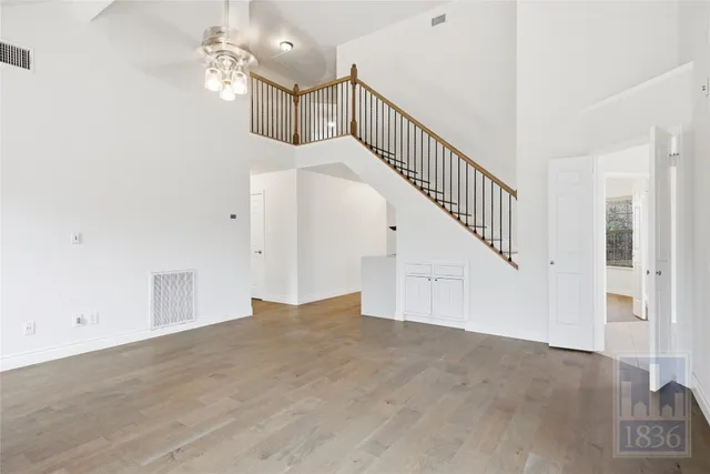 a view of a hallway with staircase