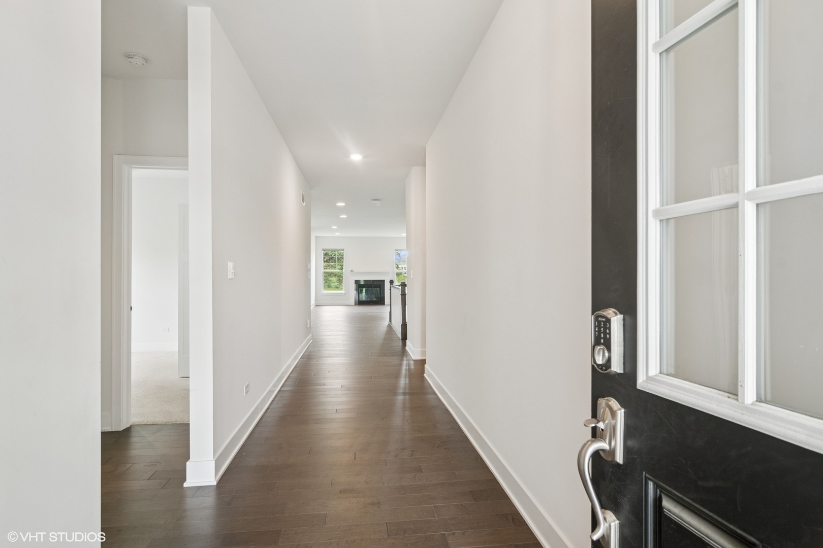 23068 Pinehurst Drive Kildeer, IL 60047 - Photo 4 of 30 a view of a hallway with wooden floor