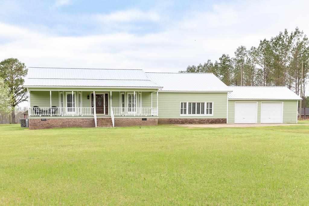 336 Clark Road Seale, AL 36875 - Photo 1 of 66 a view of a house with a swimming pool and a yard