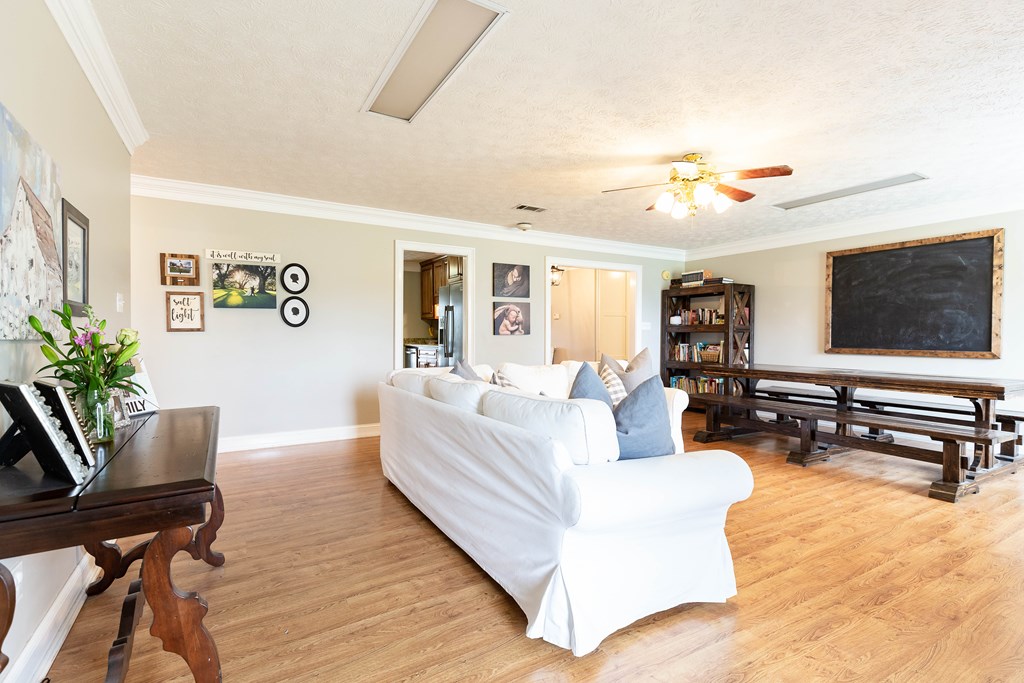336 Clark Road Seale, AL 36875 - Photo 18 of 66 a living room with furniture and a flat screen tv