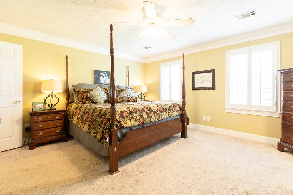336 Clark Road Seale, AL 36875 - Photo 34 of 66 a bedroom with a bed window and a mirror