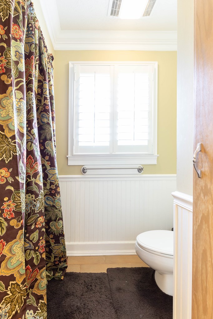 336 Clark Road Seale, AL 36875 - Photo 36 of 66 a bathroom with a toilet a sink and a bathtub