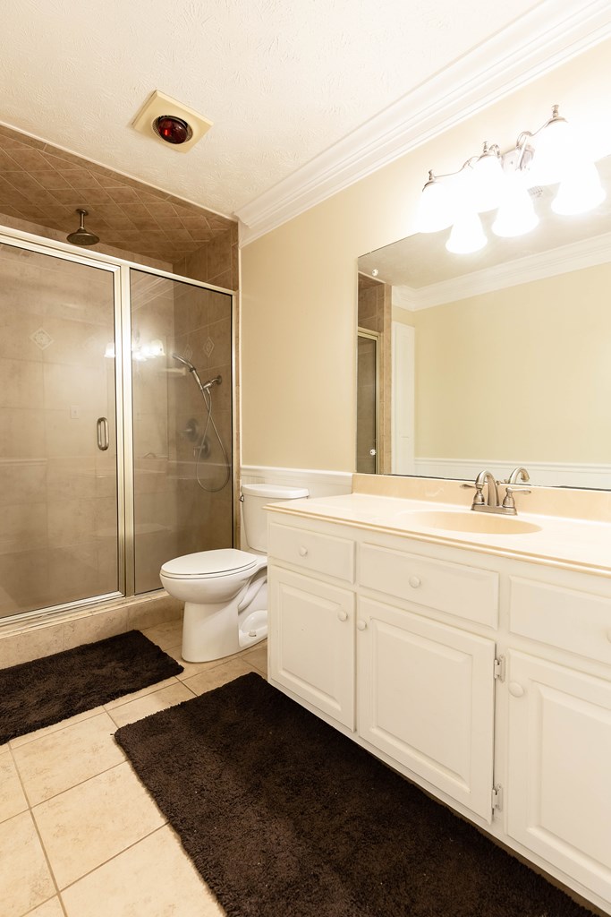 336 Clark Road Seale, AL 36875 - Photo 44 of 66 a bathroom with a sink a toilet and shower