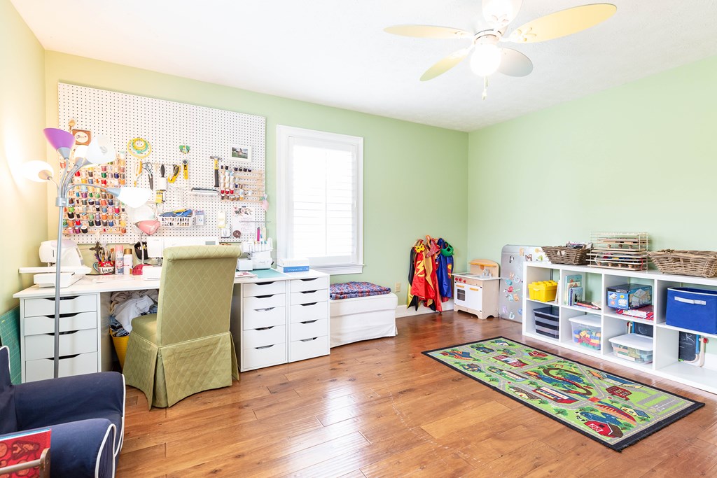 336 Clark Road Seale, AL 36875 - Photo 48 of 66 a bedroom with furniture and a book shelf
