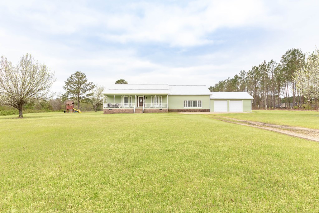 336 Clark Road Seale, AL 36875 - Photo 65 of 66 a view of an ocean with a big yard