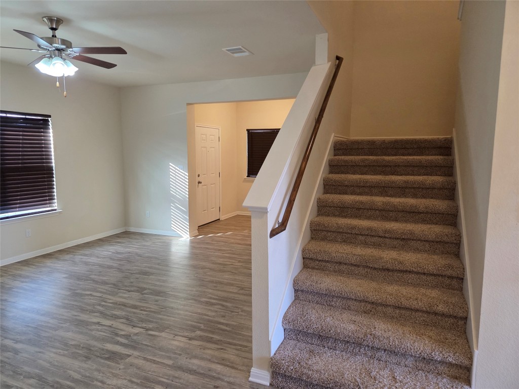 8136 Daisy Cutter Crossing Georgetown, TX 78626 - Photo 19 of 27 a view of entryway and hall with wooden floor