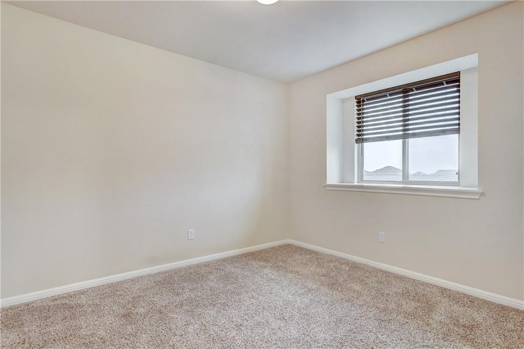 8136 Daisy Cutter Crossing Georgetown, TX 78626 - Photo 5 of 27 an empty room with a window