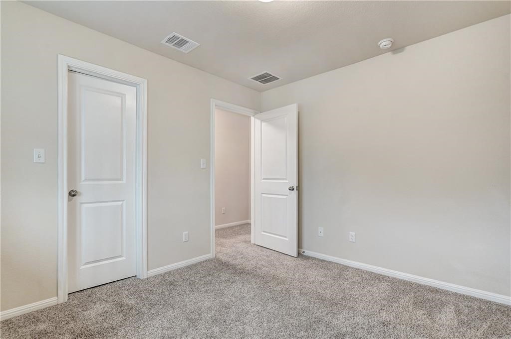 8136 Daisy Cutter Crossing Georgetown, TX 78626 - Photo 6 of 27 a view of an empty room