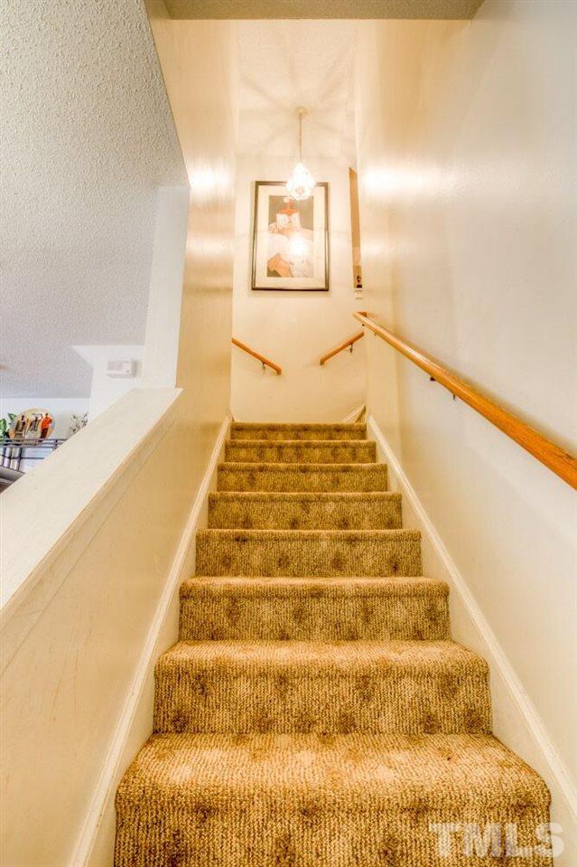 3609 Croydon Mill Way Raleigh, NC 27616 - Photo 7 of 15 a view of staircase with white walls