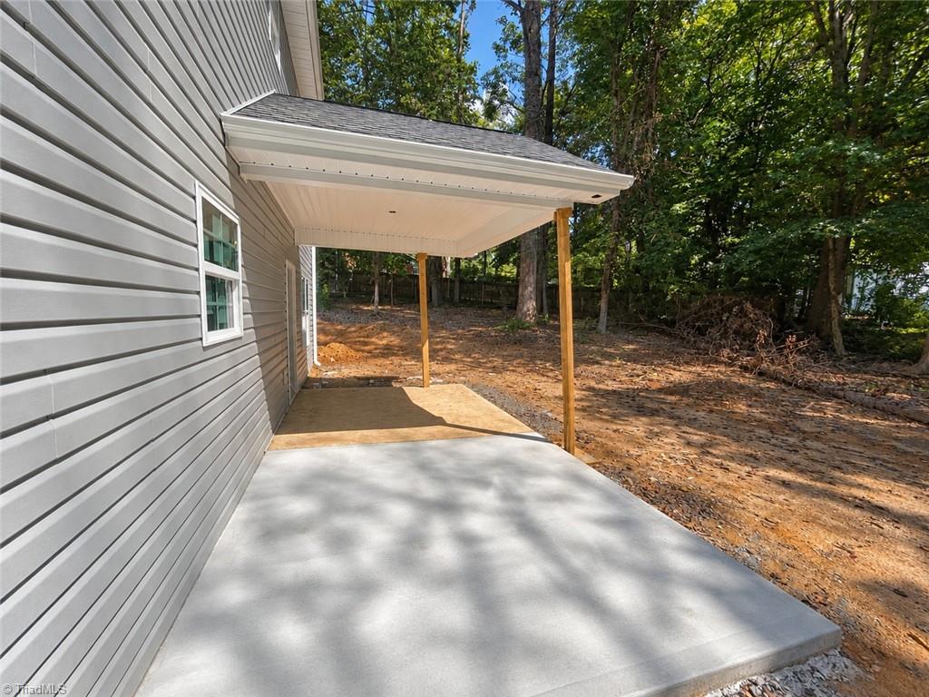 1862 Rominger Road Winston-Salem, NC 27127 - Photo 20 of 21 covered back patio with extra concrete
