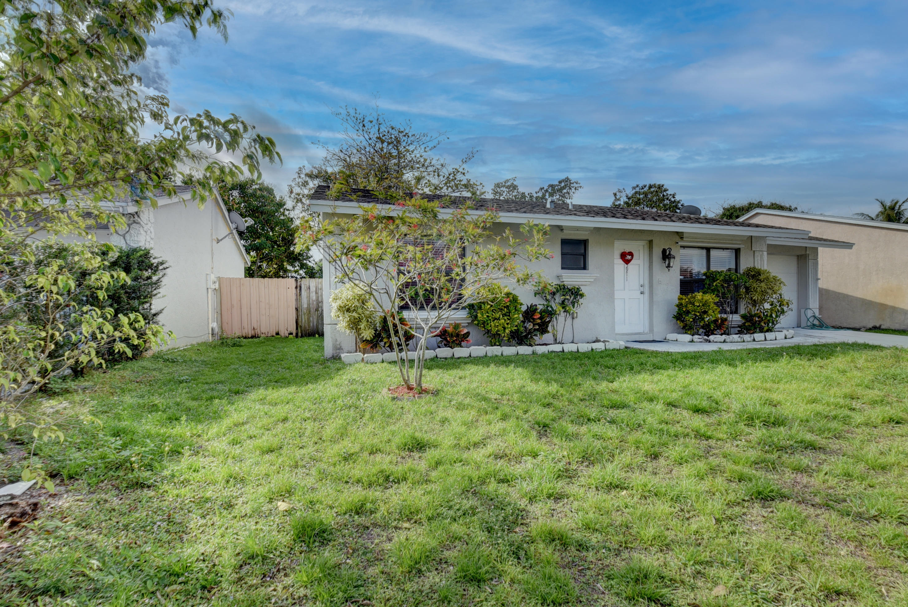 5971 Triphammer Road Lake Worth, FL 33463 - Photo 1 of 16 Front