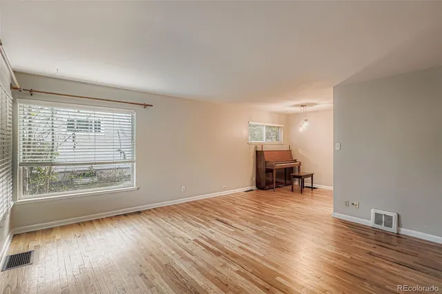 a room with furniture and fireplace