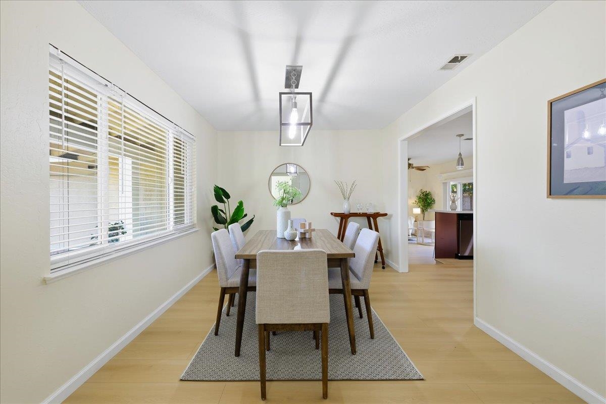 7109 Elba Way Dublin, CA 94568 - Photo 14 of 60 a view of a dining room with furniture and a window