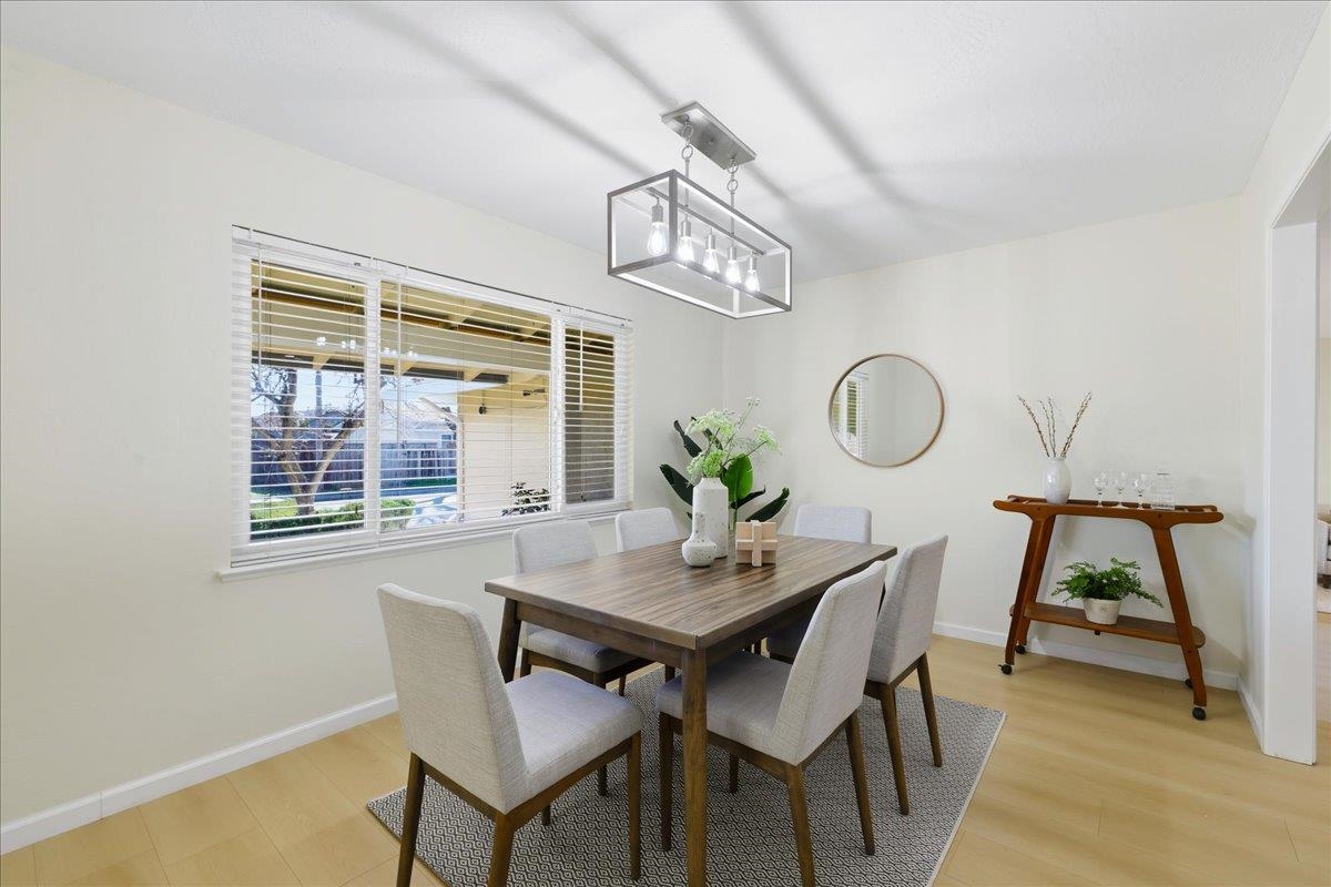 7109 Elba Way Dublin, CA 94568 - Photo 17 of 60 a view of a dining room with furniture window and wooden floor